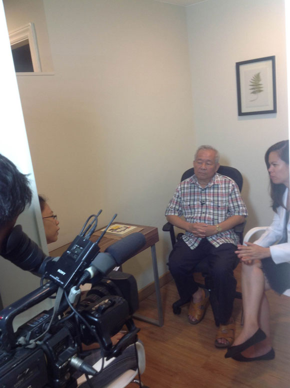 Dr Joseph Guan and Dr Cheryl Ramirez being interviewed