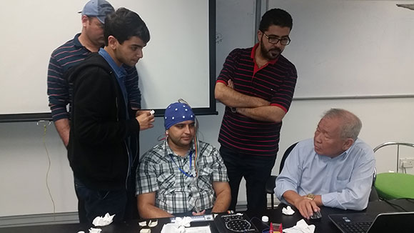 Dr Guan teaching collecting EEG data